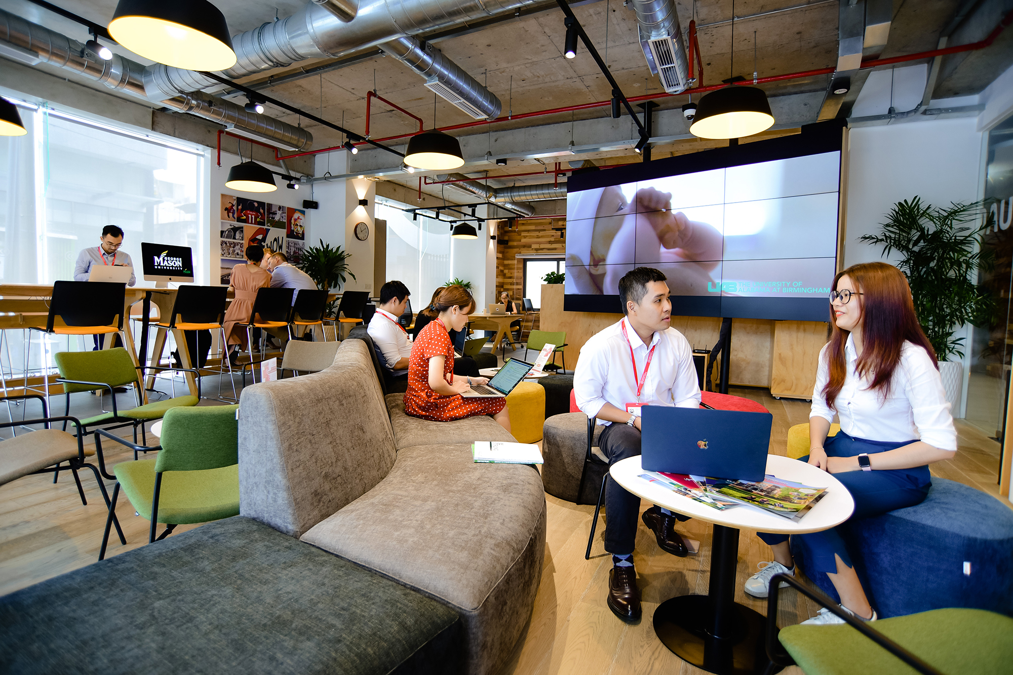 Locally based university representatives and students connect in the INTO University Access Centre in Ho Chi Minh City, Vietnam.