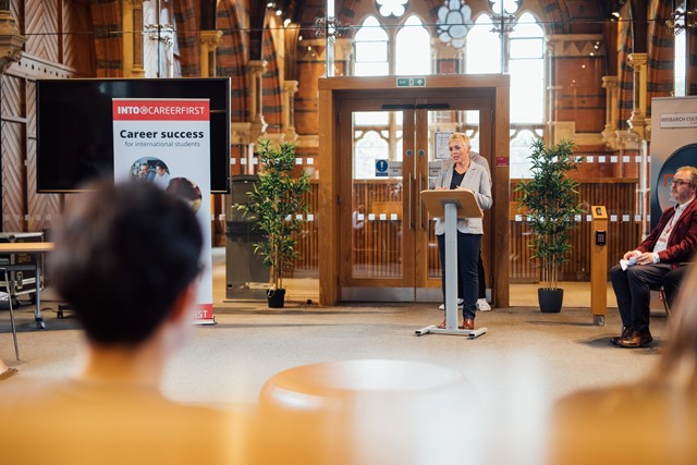 Professor Margaret Topping, Pro-Vice Chancellor for Internationalization at Queen's University Belfast, speaks to group of international students on INTO Career Boost program.